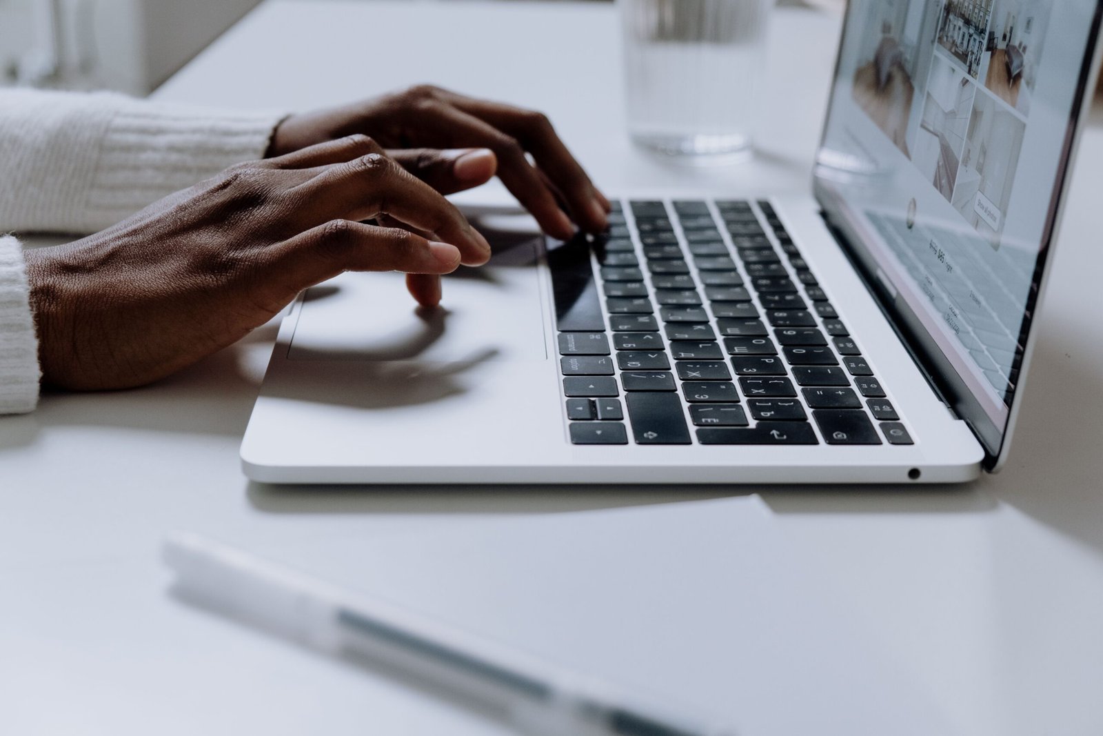 Person typing persuasive copy on a laptop