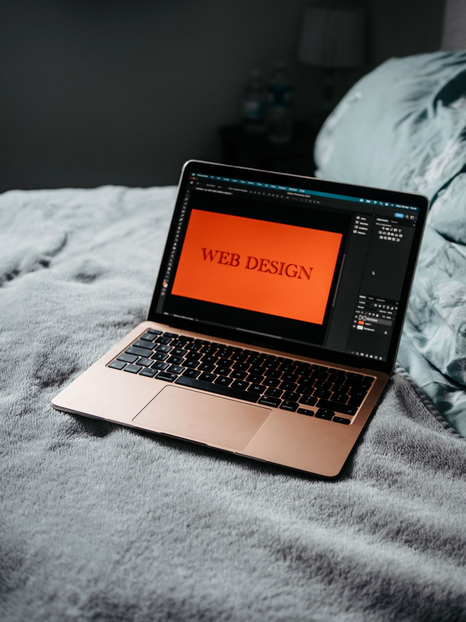 Laptop displaying web design software
